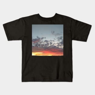 Sunset in clouds Kids T-Shirt